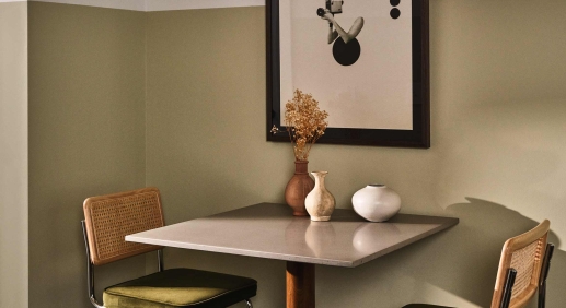 Dining seating area with abstract picture on the wall