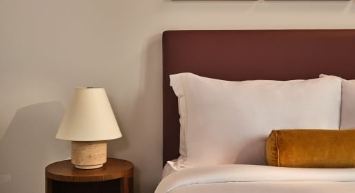 View of bed and sidetable